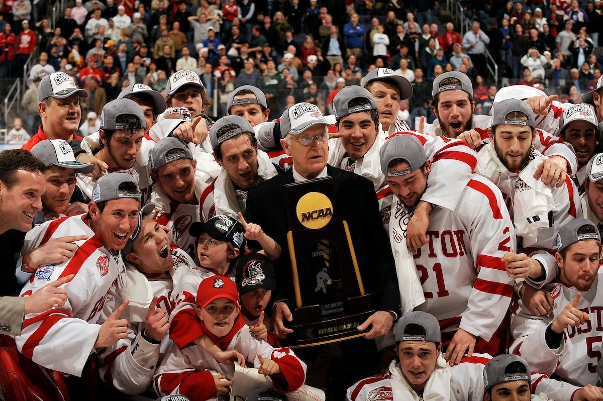 Boston University head coach Jack Parker celebrates with his team in 2009.